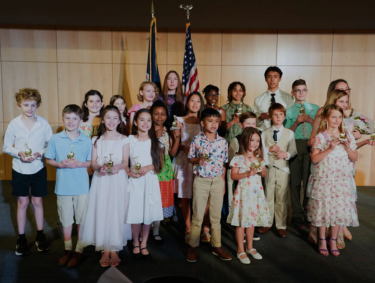 Coda Piano School students holding their recital awards